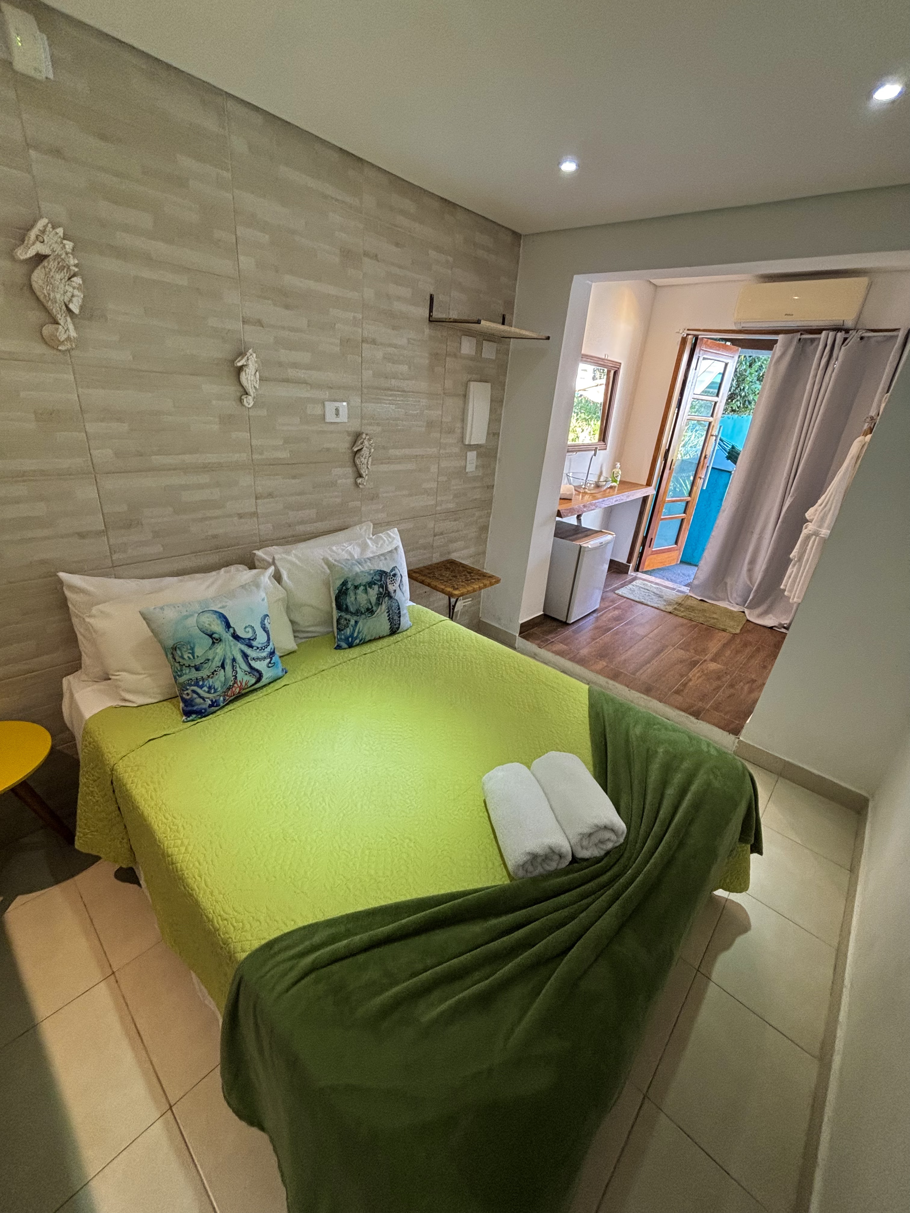 Quarto Quádruplo da Pousada Orquídeas do Guarujá