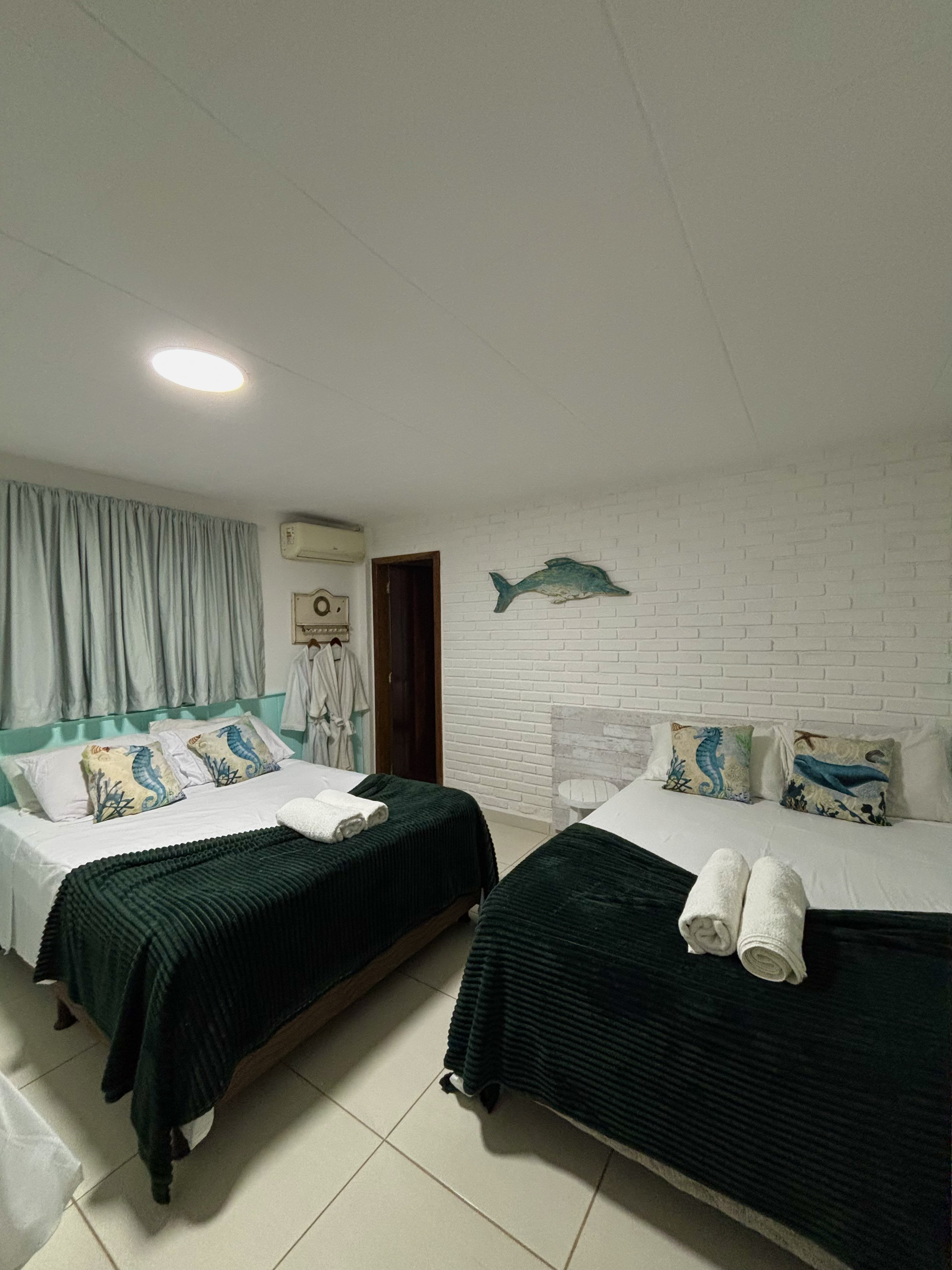 Quarto Quíntuplo da Pousada Orquídeas do Guarujá